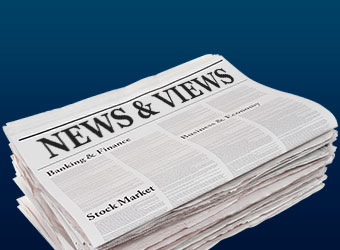 Image shows stack of newspapers